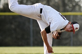 Jefferson City starting pitcher Corey Beard follows through on his delivery while working the middle innings against Fatima Comets during Friday's game at the American Legion Sports Complex.