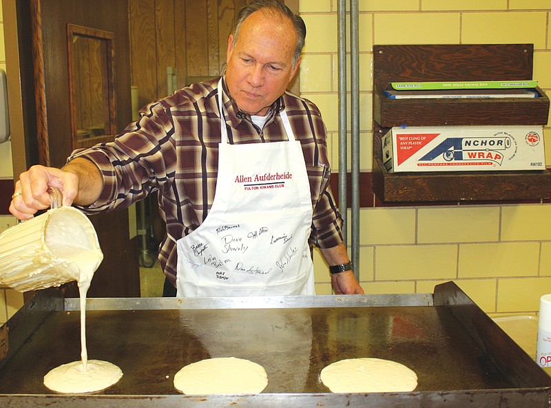 Kiwanis member Allen Aufderheide pours pancake batter onto the grill at the 2011 Fulton Kiwanis Club's annual Pancake Day held in McKee Dining Hall at the Missouri School for the Deaf. This year's Pancake Day will be held 6 a.m. to 6 p.m. April 19.