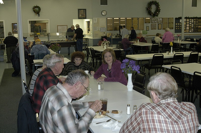 Democrat photo / David A. Wilson
Rep. Vicky Hartsler listens to concerns expressed by local residents during a visit on Thursday, April 4, to the California Nutrition Center.   