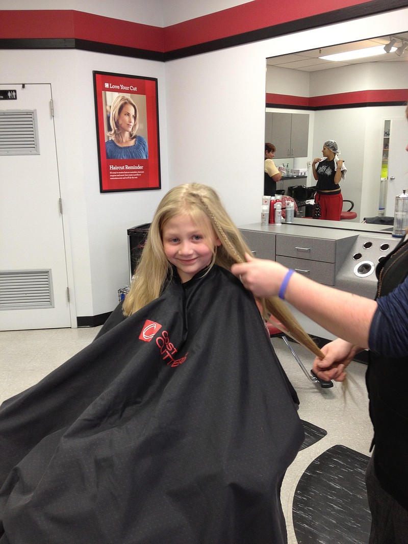 Three young girls recently donated their long hair to those facing the reality of losing their own hair while suffering from cancer.  Lynzee Green, pictured, donated her locks to Wigs for Kids.Sisters Cora and Callie Walsh donated their hair to Locks of Love. 