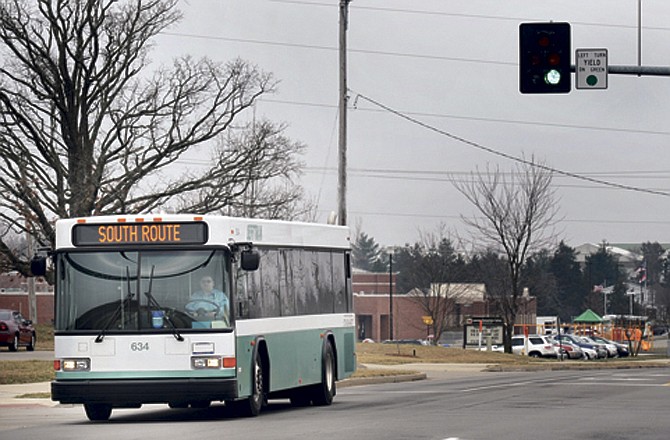 A JeffTran bus traverses a Jefferson City street in this March 4, 2012, file photo.