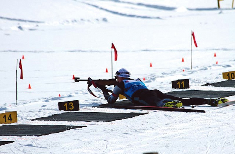 Chief Warrant Officer 2 Mitch Simpson shoots prone during the 12.5 km "pursuit race" in the National Guard Biathlon Championship earlier this year in Minnesota. The team took fifth place in the competition.
