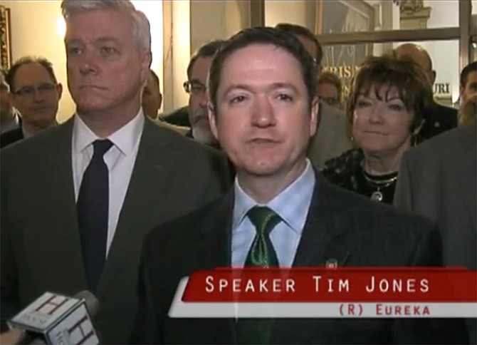 In this screenshot taken from House Communications video, Missouri House Speaker Tim Jones, R-Eureka, speaks to reporters during a press conference Thursday, April 11, 2013, about the Department of Revenue's handling of Missourians' personal information. Lt. Gov. Peter Kinder (left) stands next to Jones. See the bottom of the accompanying article to view the video.