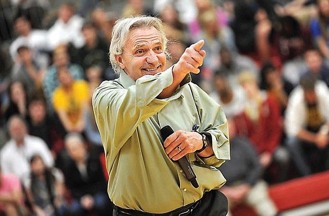Ron Glodoski, former gang leader and drug dealer turned motivational speaker, points directly to students as he asks them questions Thursday, April 11, 2013, during a speaking engagement at Jefferson City High School. 