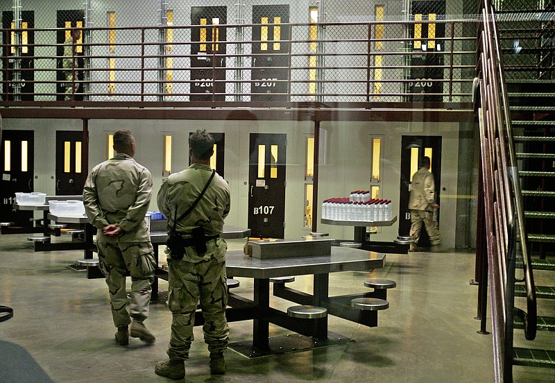 Guards clashed Saturday with prisoners at the Guantanamo Bay prison as the military sought to move hunger strikers out of a communal section of the detention center, officials said.