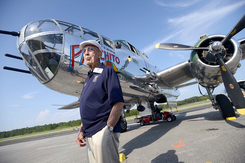 Doolittle Raider Lt. Col. Dick Cole, stands in front of a B-25 at the Destin Airport in Destin, Fla. on Tuesday before a flight as part of the Doolittle Raider 71st Anniversary Reunion. Cole was Lt. Col. Jimmy Doolittle's co-pilot during the raid.