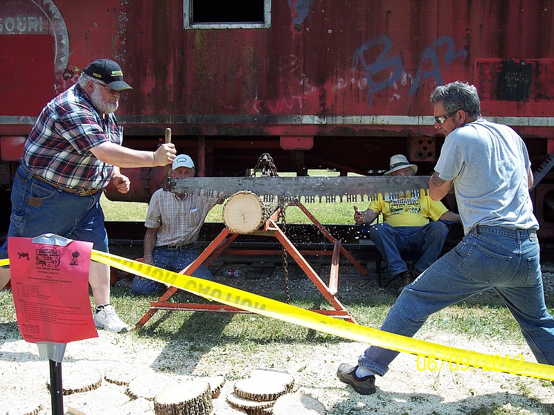 Establishing a good rhythm is key to winning the cross-cut saw competition at the Russellville Engine Show and Frog Leg Festival. Join in the fun this year for a little friendly competition. 