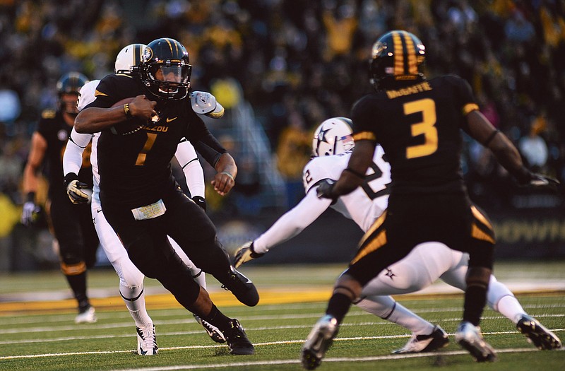 Missouri quarterback James Franklin runs the ball during a game against Vanderbilt last season.