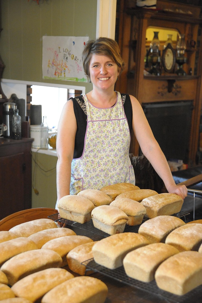 Renee Davis bakes 100 percent whole wheat bread with flax and millet from flour she and her family grind fresh. They also use fresh bread dough for pizza crust and other food needs. 