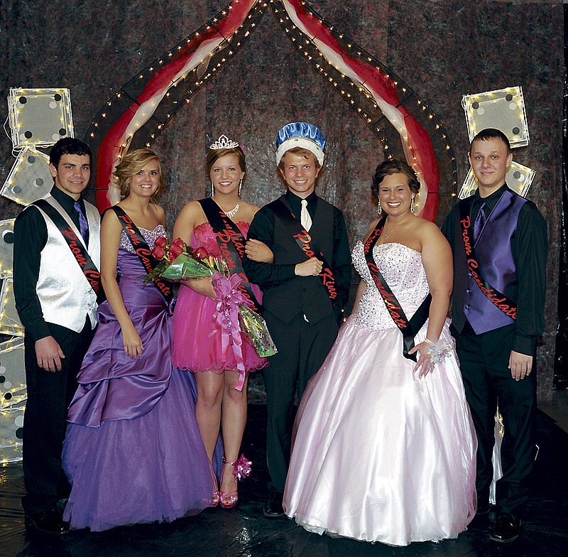 Democrat photo / April Arnett
Newly crowned California High School Prom Queen and King Alayna York and Dakota Harris, center, pose with fellow king and queen candidates, at left, Jacob Kueffer and Cheyenne Doughty, and at right, Taylor Bleich and Courtland Gerhart, just after the coronation Saturday night at the Knights of Columbus Hall, St. Martins. The theme for this year's prom was "Casino".