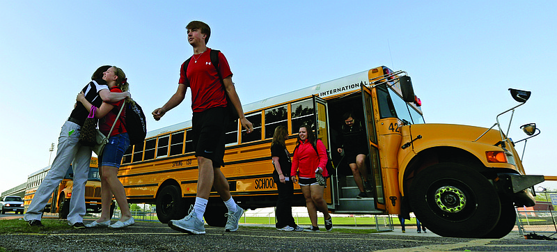 High school students from West, Texas, arrive for classes at a temporary facility provided by the Connally Independent School District.
