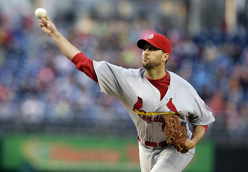 Cardinals starter Adam Wainwright delivers to the plate during Tuesday night's game against the Nationals in Washington.