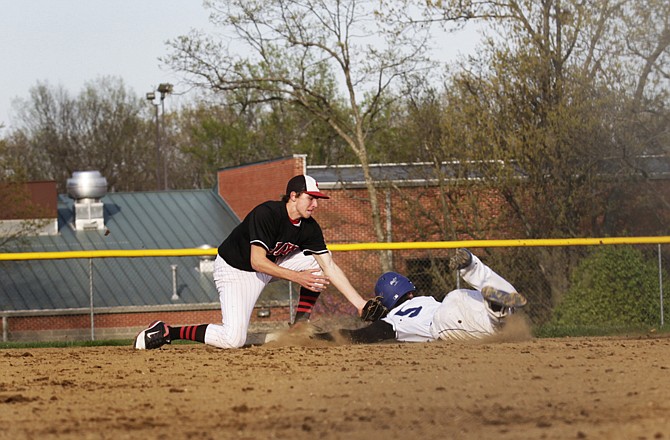 Jays shortstop Gabe Marcantonio slaps the tag on Cory Hanger of South Callaway for an out at second base during the sixth inning of Thursday's game at Mokane.