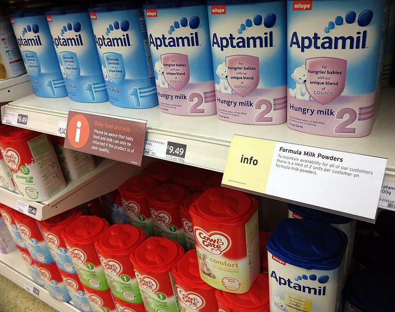 A sign limiting the purchase of baby milk formula powder hangs on the shelf in a supermarket in London. Parents thousands of miles away in China have been using the Internet or tapping friends and relatives in Europe to buy up stocks of high quality European-produced formula baby milk and paying the price of exporting the product, and the demand is so high that shops across much of Europe are rationing the sales of baby formula milk. 