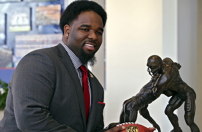 Broncos first-round pick Sylvester Williams poses for a picture Friday at the team's headquarters in Englewood, Colo.