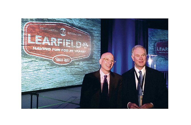 Missouri-based Learfield Communications celebrated 40 years of business last week with a retreat to Dallas. Author Seth Godin, left, spoke to Learfield employees. Also pictured is Clyde Lear, co-founder of Learfield Communications. Lear founded the company in Jefferson City with the late Derry Brownfield in 1972.