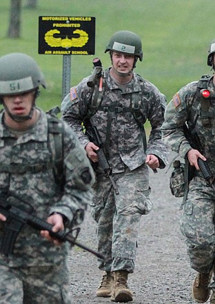 Sgt. 1st Class Greg Robinson, an amputee, runs during the Sabalauski Air Assault School at Fort Campbell, Ky. Robinson graduated from the 10-day course on Monday, and is the first amputee to have completed the course. 