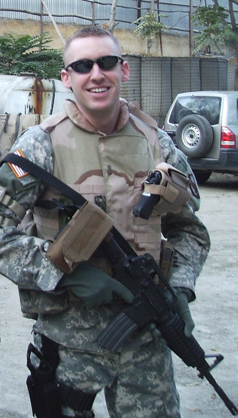 Lt. Jason Kander at Camp Eggers, Afghanistan, while preparing for a convoy to Bagram Air Base in 2006. Inset at left, Kander as Missouri Secretary of State. 
