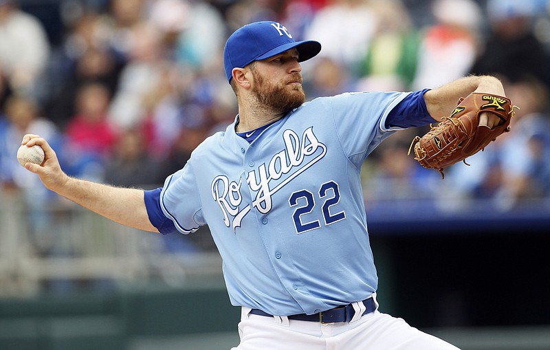 Kansas City Royals pitcher Wade Davis throws in the first inning of a baseball game against the Chicago White Sox at Kauffman Stadium in Kansas City, Mo., Sunday, May 5, 2013.