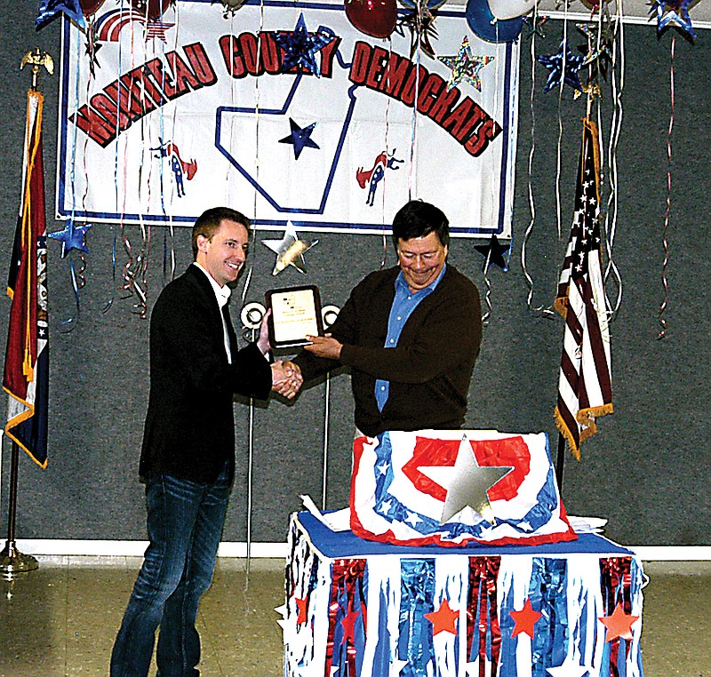 At the Moniteau County Truman Day event Saturday, May 4, Missouri Secretary of State Jason Kander is presented with the Harry S Truman Award by John Kay.