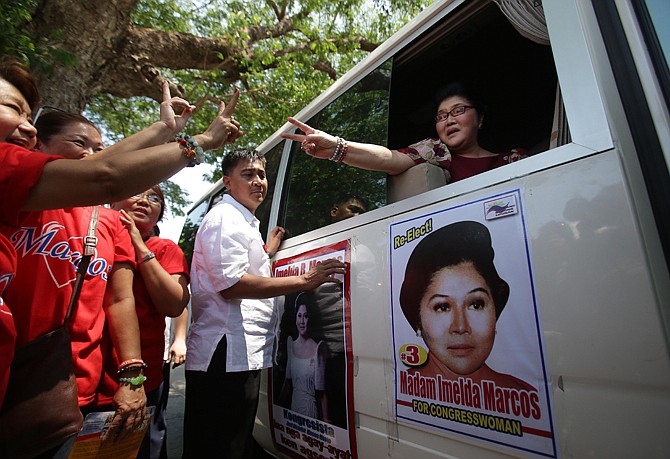 Twenty-seven years after her dictator husband was ousted by a public revolt, Imelda Marcos has emerged as the Philippines' ultimate political survivor: She was back on the campaign trail this week, dazzling voters with her bouffant hairstyle, oversized jewelry and big talk in a bid to keep her seat in Congress. 