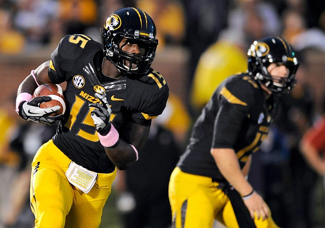 In this Sept., 15 2012, file photo, Missouri wide receiver Dorial Green-Beckham carries the ball during the second quarter of an NCAA college football game against Arizona State in Columbia, Mo. Production did not live up to the hype last fall for Green-Beckham, the teenage sensation already known better by his three initials before arriving at Missouri. This year, the Tigers are hoping, will be DGB's true coming-out party as the game-breaker they sorely need to compete in the SEC. 