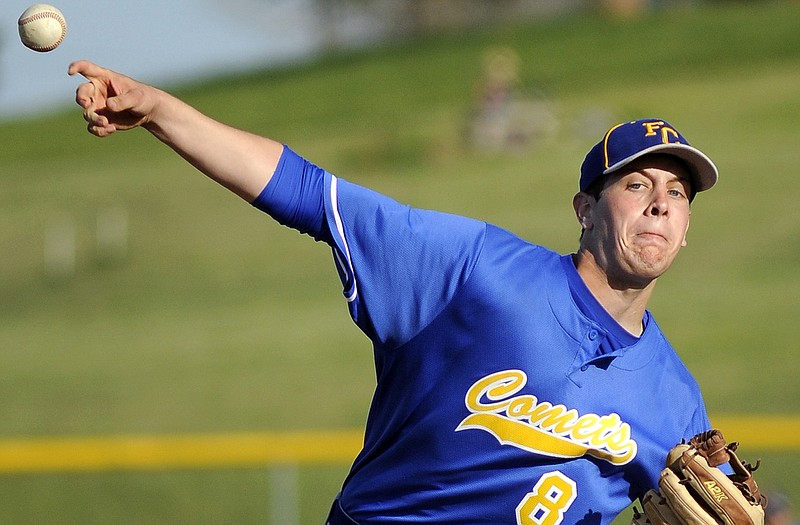 Fatima's Seth Lehmen delivers a pitch during Monday night's game at the Falcon Athletic Complex in Wardsville.