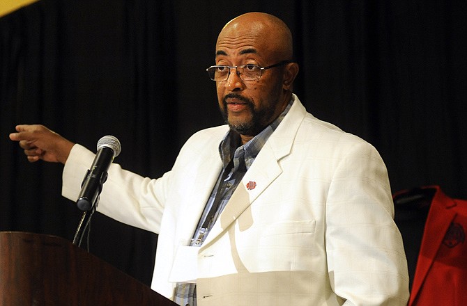 Victor Thomas, shown last month as the Lincoln track team was inducted into the Missouri Sports Hall of Fame, was named the Mid-America Intercollegiate Athletics Association Women's Track Coach of the Year on Tuesday.