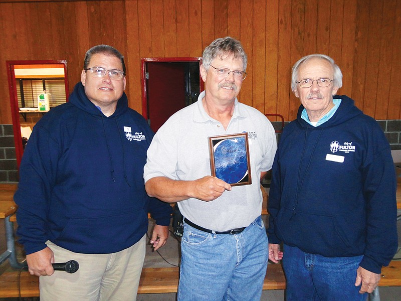 Building and Grounds Supervisor Cal Luckett, center, stands with City Administrator Bill Johnson, left, and Deputy Mayor Richard Vaughn at the City of Fulton's City Picnic Friday at Memorial Park. Luckett was named the city's Employee of the Month.                       