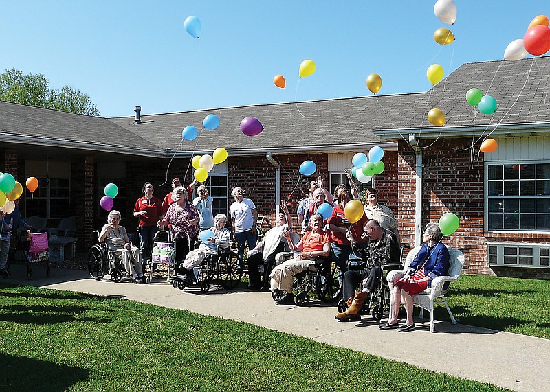 On Monday, May 13, 2013, residents and staff of Moniteau Care Center in California, Mo., released 50 balloons to mark the beginning of National Nursing Home Week. 
