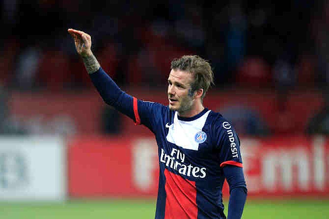 Paris Saint Germain's midfielder David Beckham from England, waves as he leaves the field, during his French League One soccer match against Brest, at the Parc des Princes stadium, in Paris, Saturday, May 18, 2013. Paris Saint-Germain hopes to strike a deal with David Beckham in the next two weeks in which the former England captain will work with the French club after retirement, possibly in an ambassadorial role. 