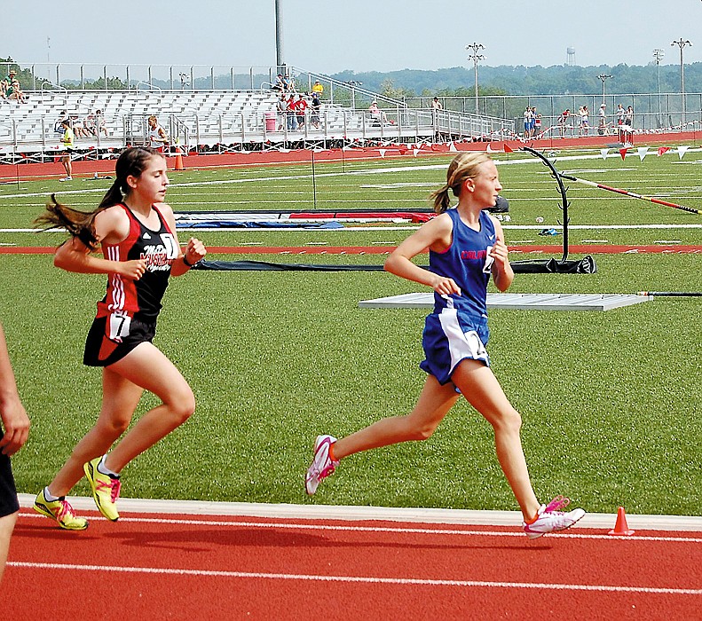 California's Lizzy Kirby, at right, competes at the Class 3 Sectional Meet Saturday at Ozark High School. Kirby placed fourth in the 3200 Meter to advance to the Class 3 State Track Championships May 24-25 at Dwight T. Reed Stadium, Jefferson City. California's Leah Korenberg finished the event in second place to advance as well.