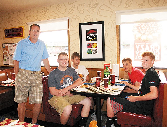 At the California High School Annual Golf Banquet Thursday at the California Pizza Hut, from left, are Coach Doug Miller, John Wolken, Curtis Lehman, Tyler Elliott and Kade McAdams. (Also present but not shown were Cole George, Conner George and Damon Shaw.)