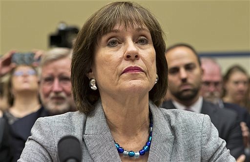 Lois Lerner, the Internal Revenue Service official at the center of the storm over the agency's targeting of conservative groups, defended herself during a brief appearance before the House Oversight and Government Reform Committee.