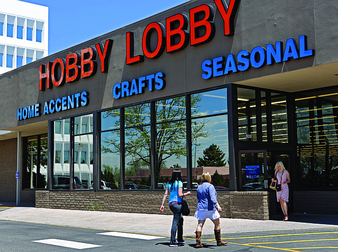 Customers are seen at a Hobby Lobby store in Denver on May 22, 2013. 