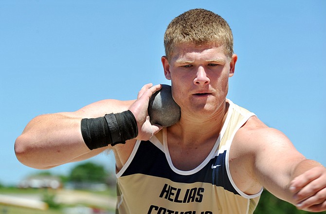 Helias' Will Fife prepares to throw the shot during action at the Class 3 state track meet Friday at Dwight T. Reed Stadium. Fife won the state championship in the event.