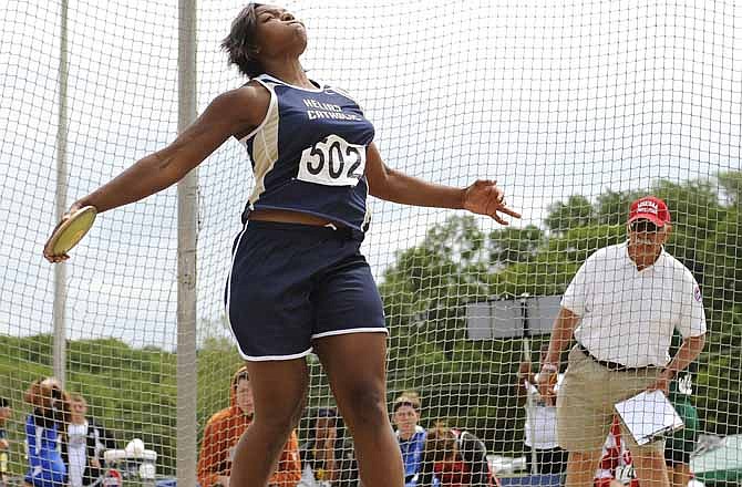 Bre Zanders of Helias hurls the discus in the Class 3 girls state championships Saturday in Jefferson City.