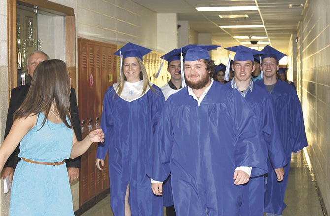 South Callaway seniors make their way to the commencement ceremony held Friday night at the school in Mokane.