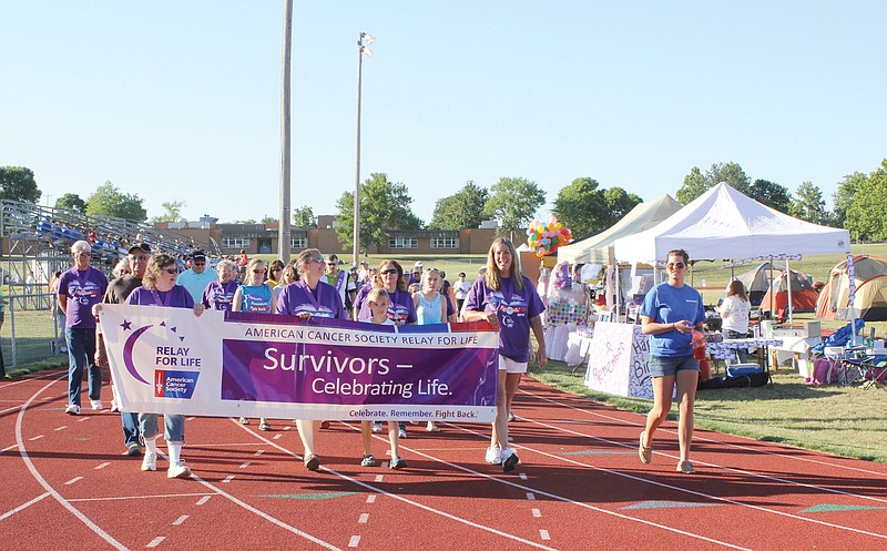 Callaway County's cancer survivors got the 2012 Relay for Life of Callaway County started Friday night at the Missouri School for the Deaf track. This year, many changes include changing the starting date from Friday to Saturday, June 1, as well as the new Relay for Life parade beginning 2 p.m. June 1.