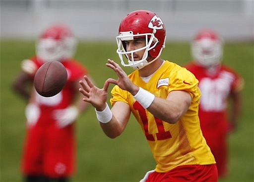 Chiefs quarterback Alex Smith has been up and down during his first workouts with the team in Kansas City.