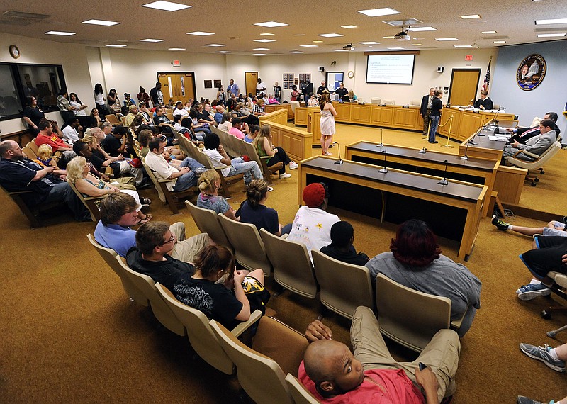 Judge Cotton Walker presides over a full docket of cases during a Jefferson City municipal court session at City Hall last Wednesday night, Sessions will switch to day sessions through the summer.