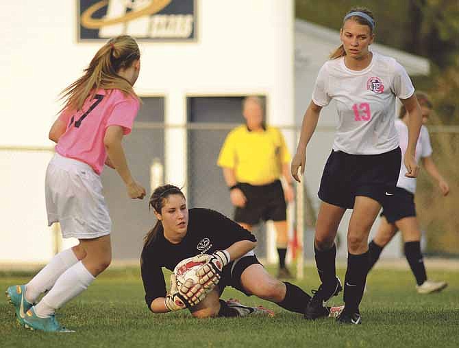 Jefferson City goalkeeper Becca Sturgess, seen in the News Tribune file photo above, earned all-state honors this season from the Missouri State High School Soccer Coaches Association.
