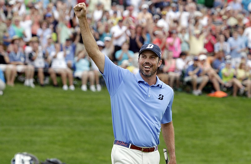 Matt Kuchar reacts after sinking a birdie putt on the 18th green during the final round of the Memorial on Sunday in Dublin, Ohio.