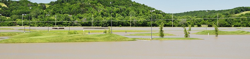 Floodwaters cover the nine-hole course at Turkey Creek Golf Center after the Missouri River backed up into Turkey Creek over the weekend.
