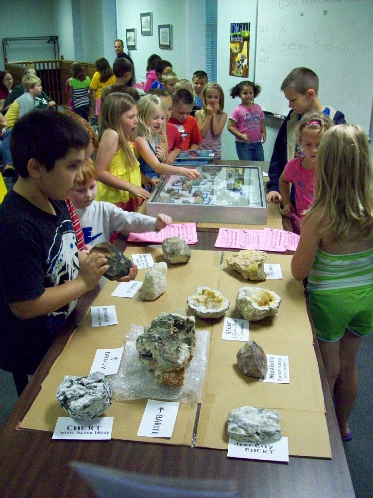 Geology Rocks presented at Wood Place
Photo submitted
The Osage Rock and Mineral Club presented a program on Missouri Rocks and Minerals.  Fifty-three children attended the presentation at Wood Place Library, Thursday, May 30.  The club provided sample rock packets to all children present. The children enjoyed viewing all the varities of rocks found in Missouri.