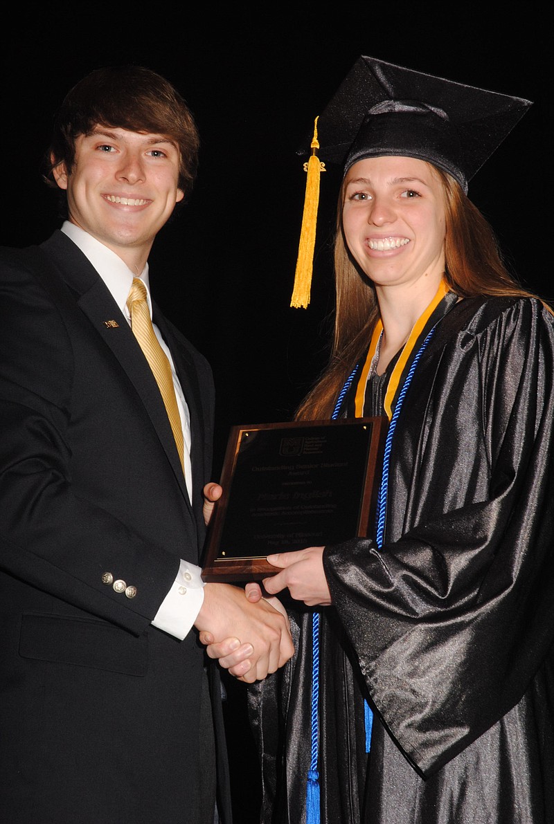 Photo submitted
Kody Raines, CAFNR Student Council president presents the Outstanding Senior Award to Marie Inglish.