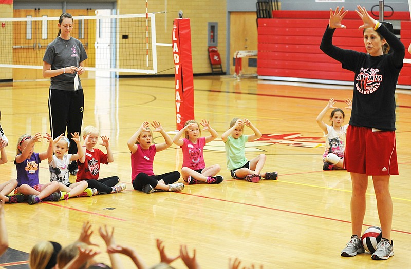 Jefferson City High School volleyball coach Christine Meyer teaches the basics of play during volleyball camp this week at Fleming Fieldhouse.