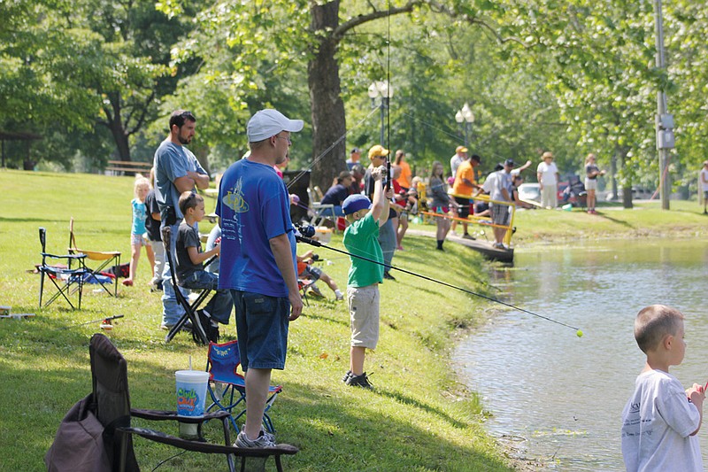 About 55 kids and their families camped out a spot on the Veterans Park lake shore Saturday to go shoot for a record in the eighth annual Alan Leake Memorial Kids Fishing Tournament Saturday.