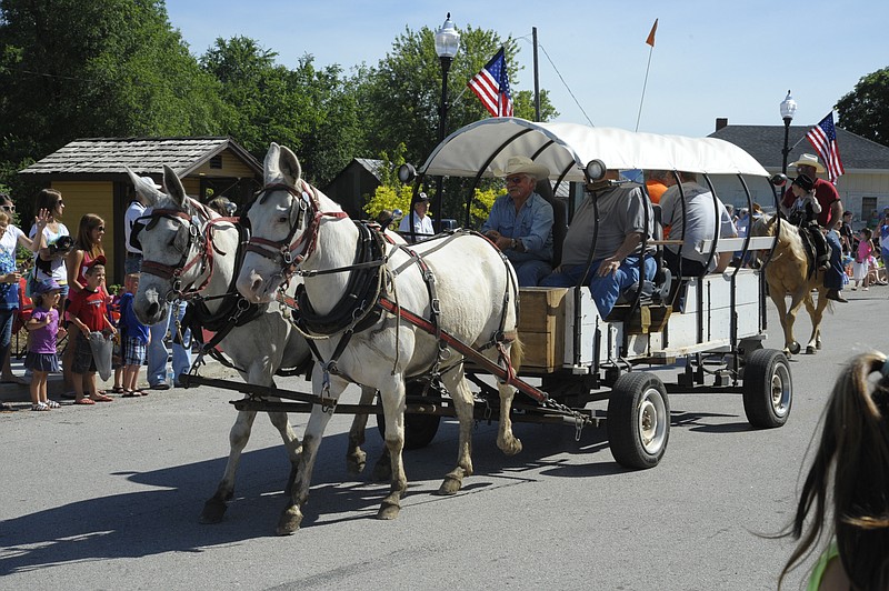 A variety of transportation modes were represented in the Russellville Frog Leg Festival and Engine Show on Saturday, June 9, 2013, including a covered wagon.