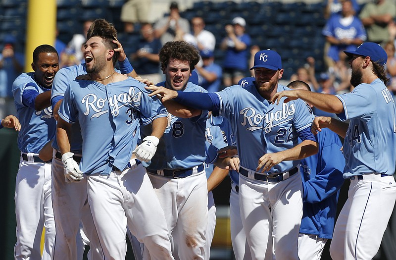 The Royals' Eric Hosmer celebrates his game-winning RBI single during the 10th inning of Wednesday's game against the Tigers at Kauffman Stadium in Kansas City.